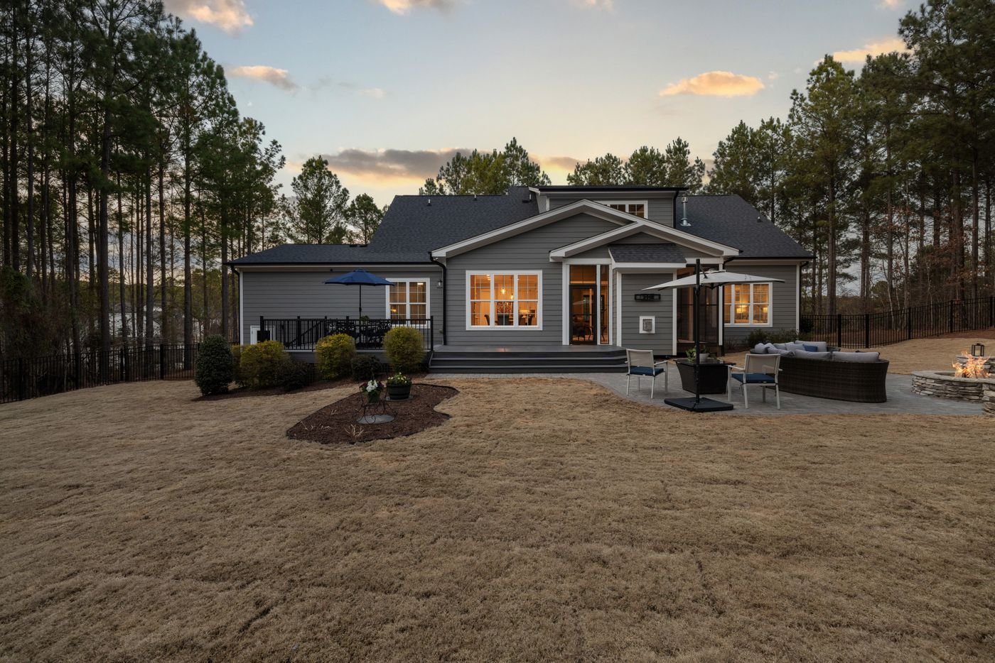 Beautiful finished house with a premium dark charcoal roof, architectural photograph